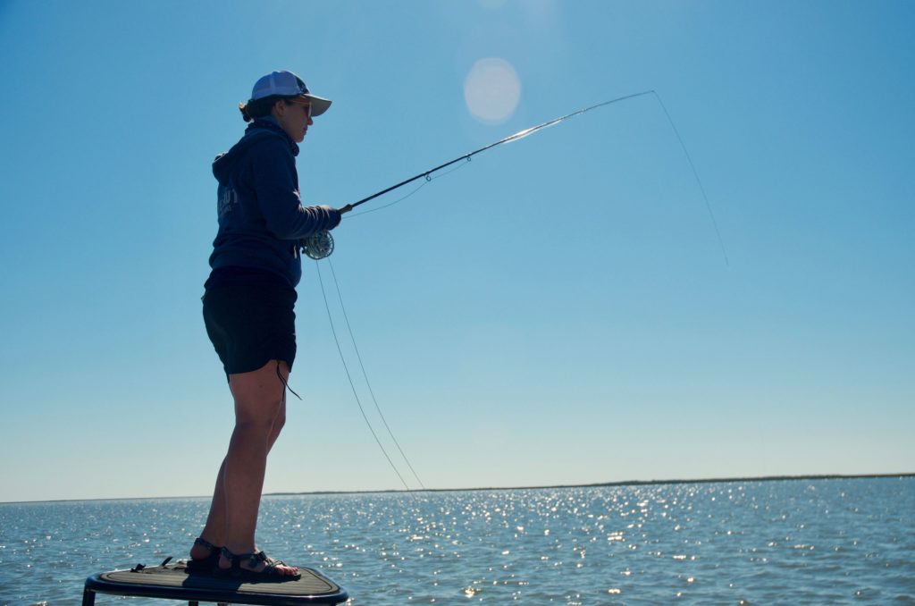 Woman saltwater fly fishing 