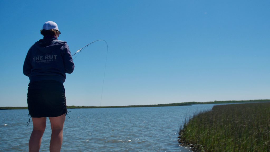 Woman saltwater fly fishing