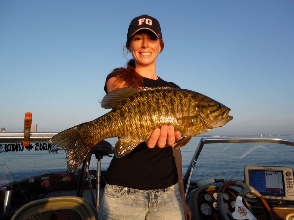 Woman holding fish